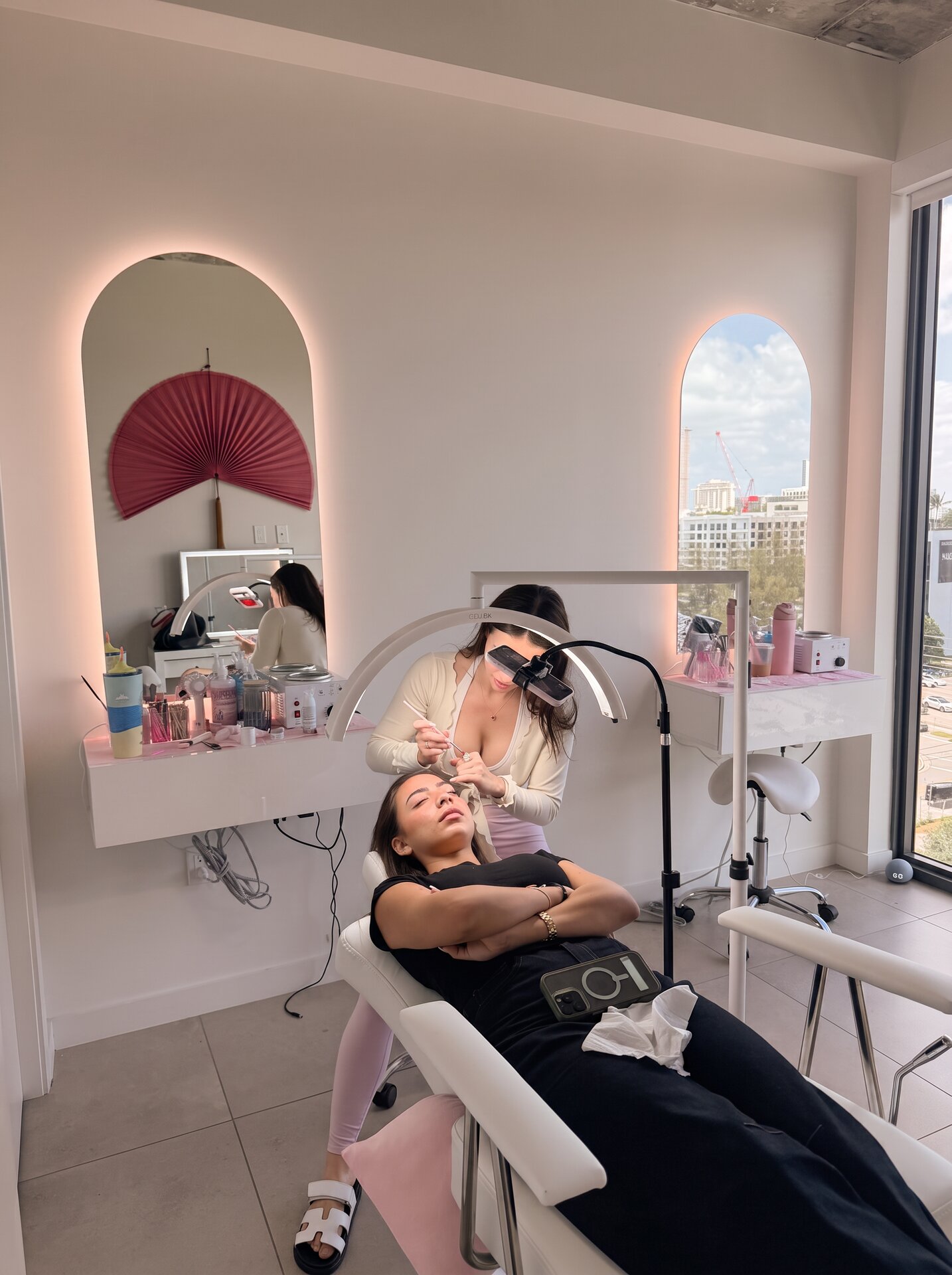 Max, brow artist and founder of WaxedByMax, in her studio