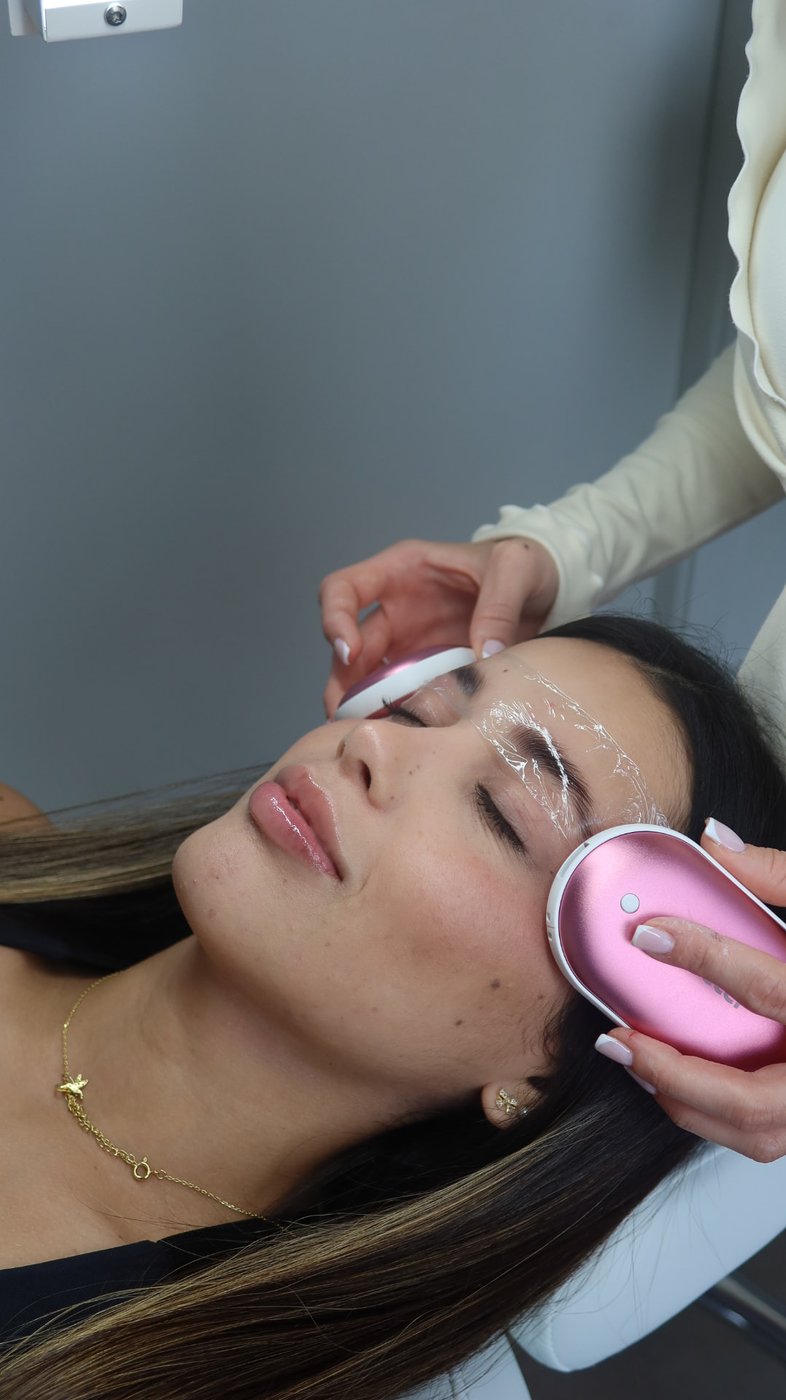 Close-up of a brow wax being applied in Max's studio